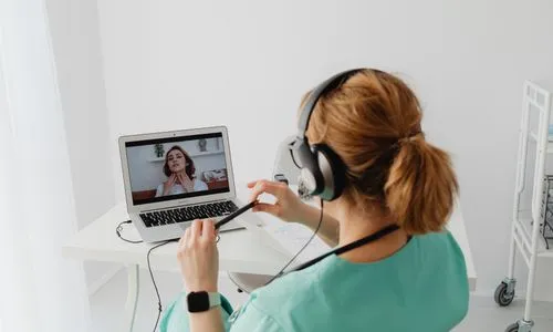 Licensed clinician reviewing patient intake online